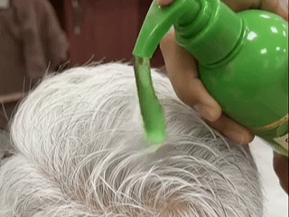 Foam shampoo being massaged into hair