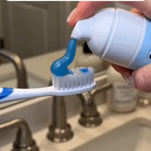 Micro foam toothpaste spreading onto toothbrush